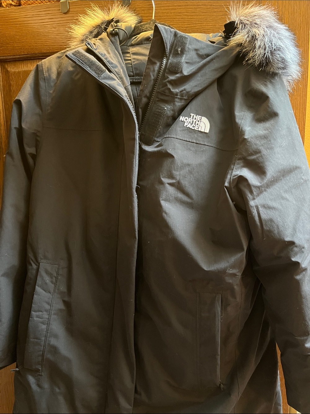 The North Face Women’s Black Hooded Puffer Coat with Faux Fur Trim